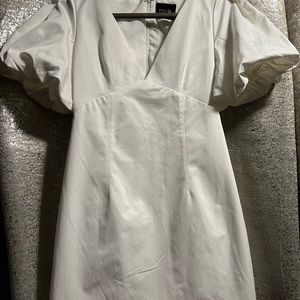White mini dress. Brand new, size small.